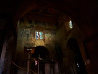 Saint-Michel d'Aiguilhe interior with murals and stained glass windows